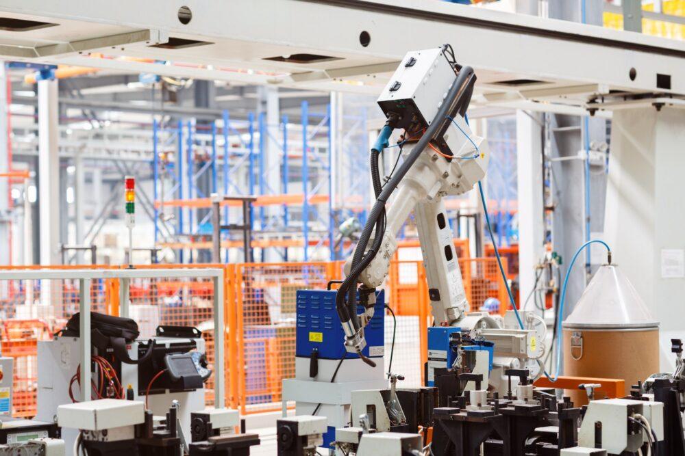 Industrial photo of Robot working in modern factory