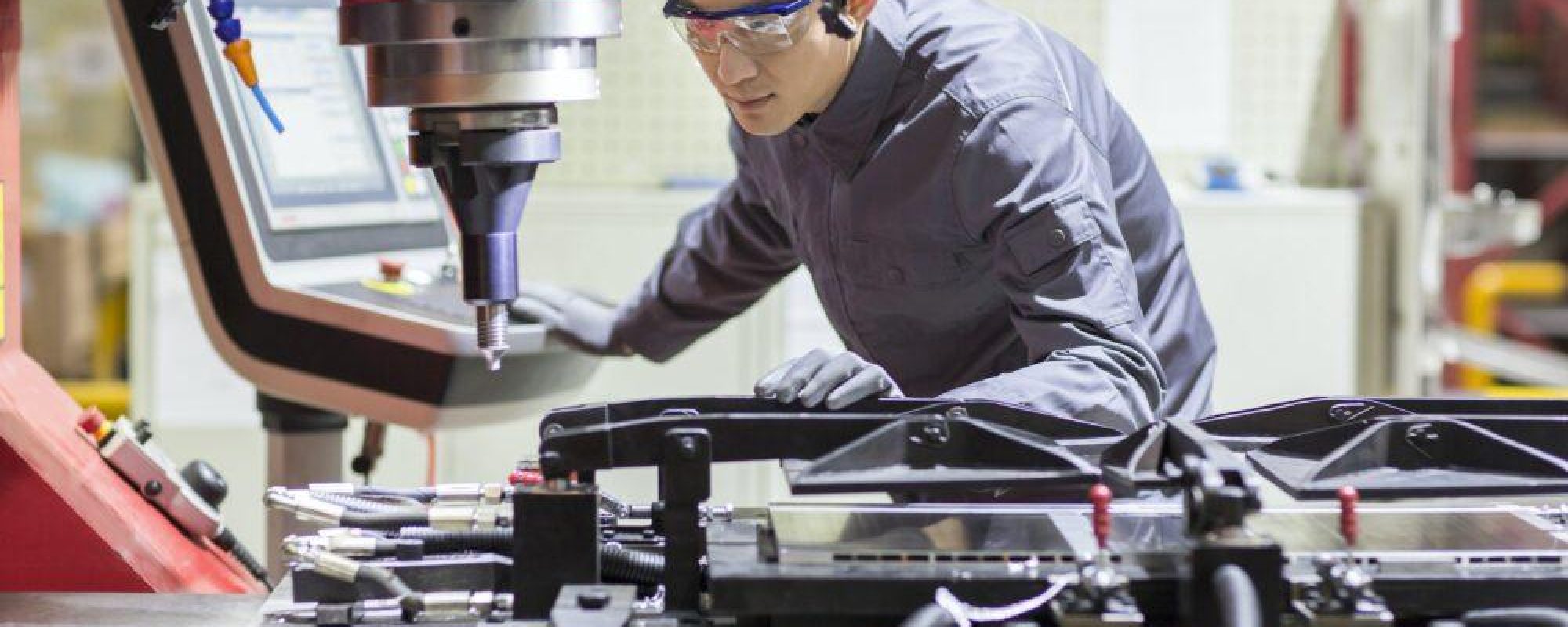 Young engineer working in the factory